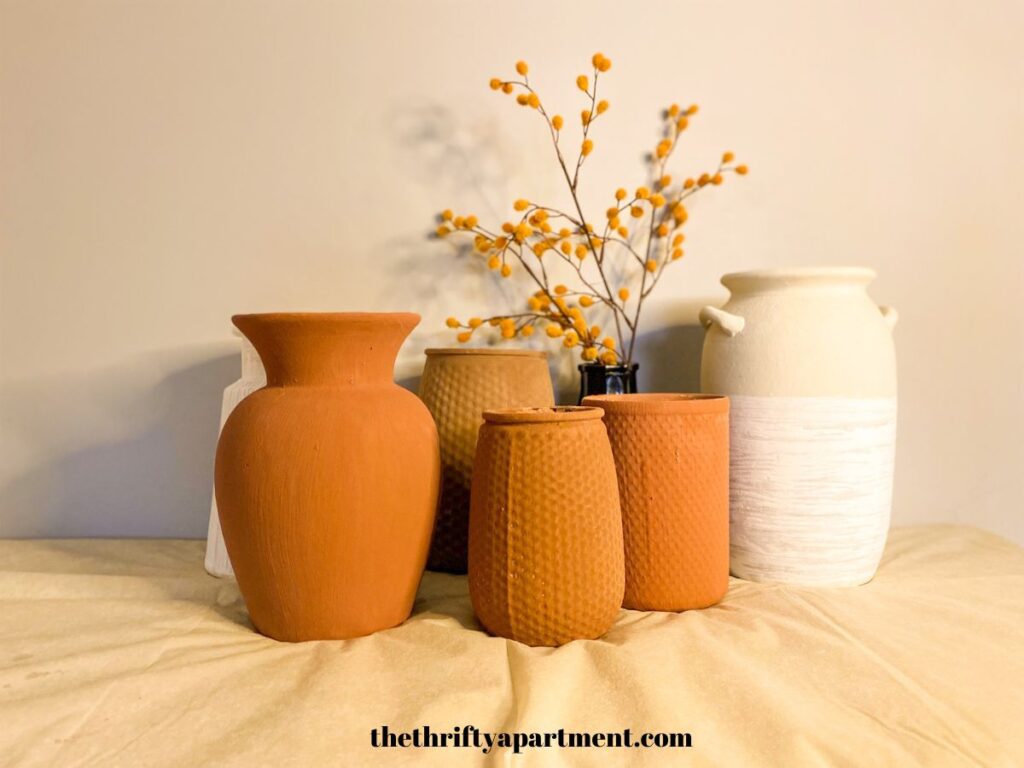 Acrylic painted vases that look like terracotta