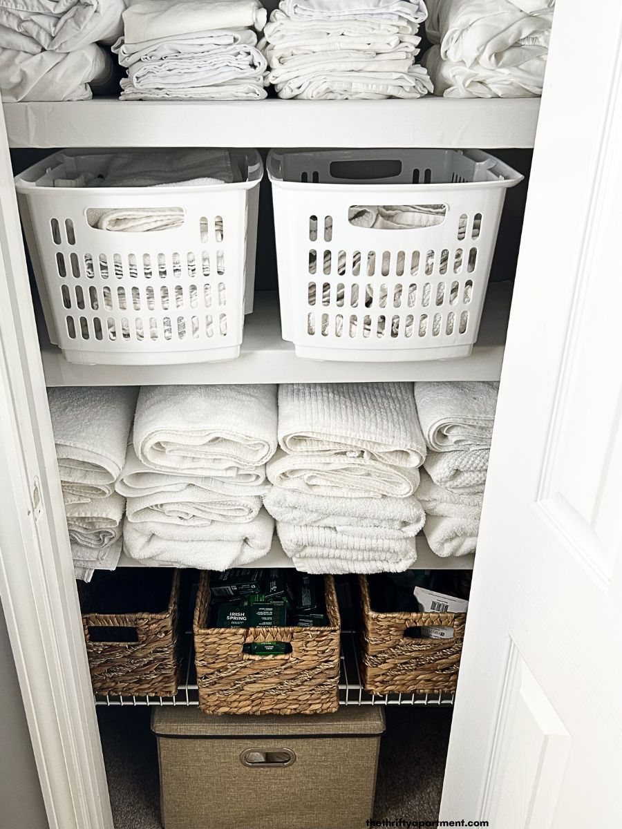 Linen Closet Organization with Baskets: A simple way to eliminate