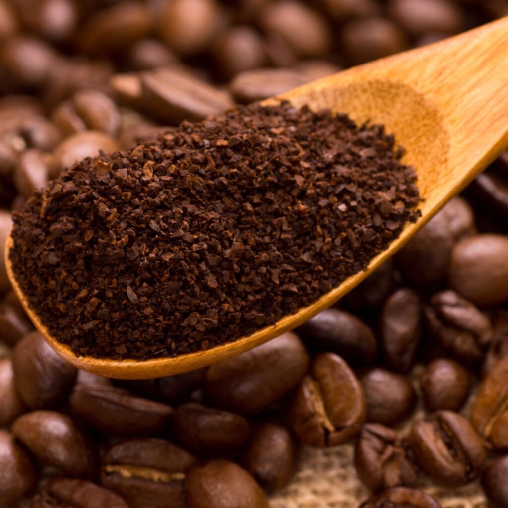 coffee grounds in spoon
