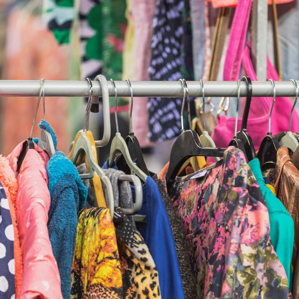 thrift clothes on rack