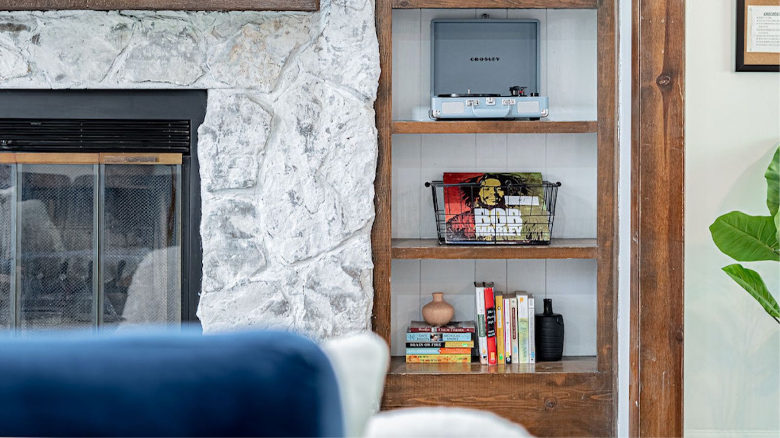 books on a whitewash bookshelves