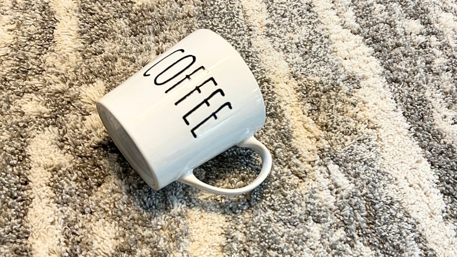 coffee cup on carpet