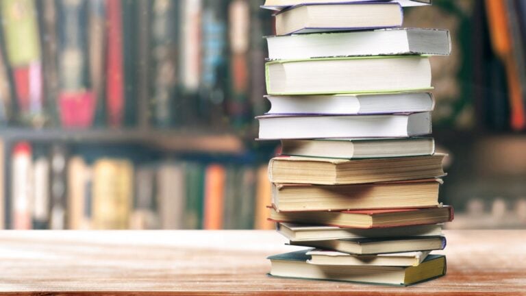 stack of books in library