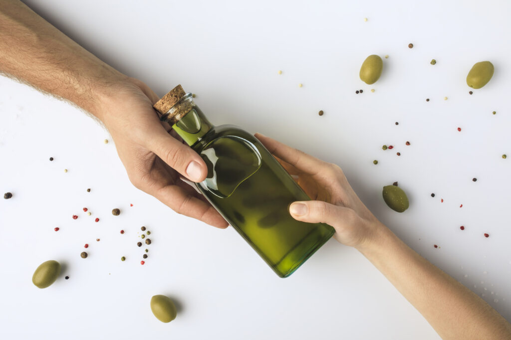 olive oil with hands