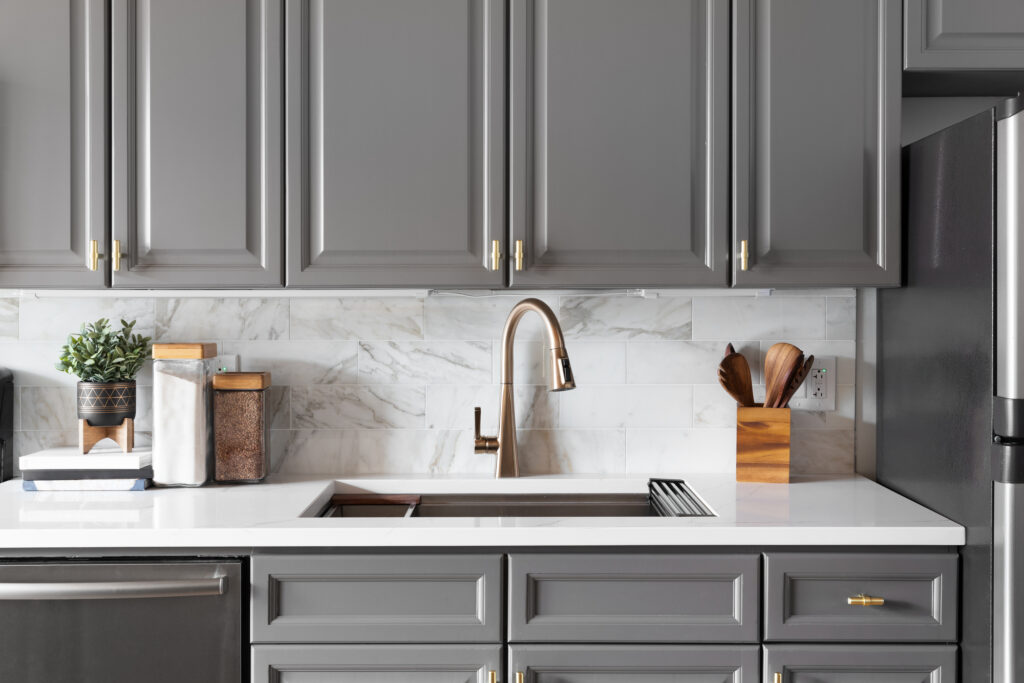 gray kitchen cabinets white countertop