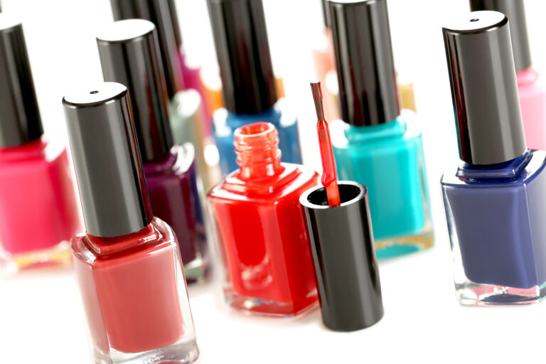 Bottles of nail polish on a white background
