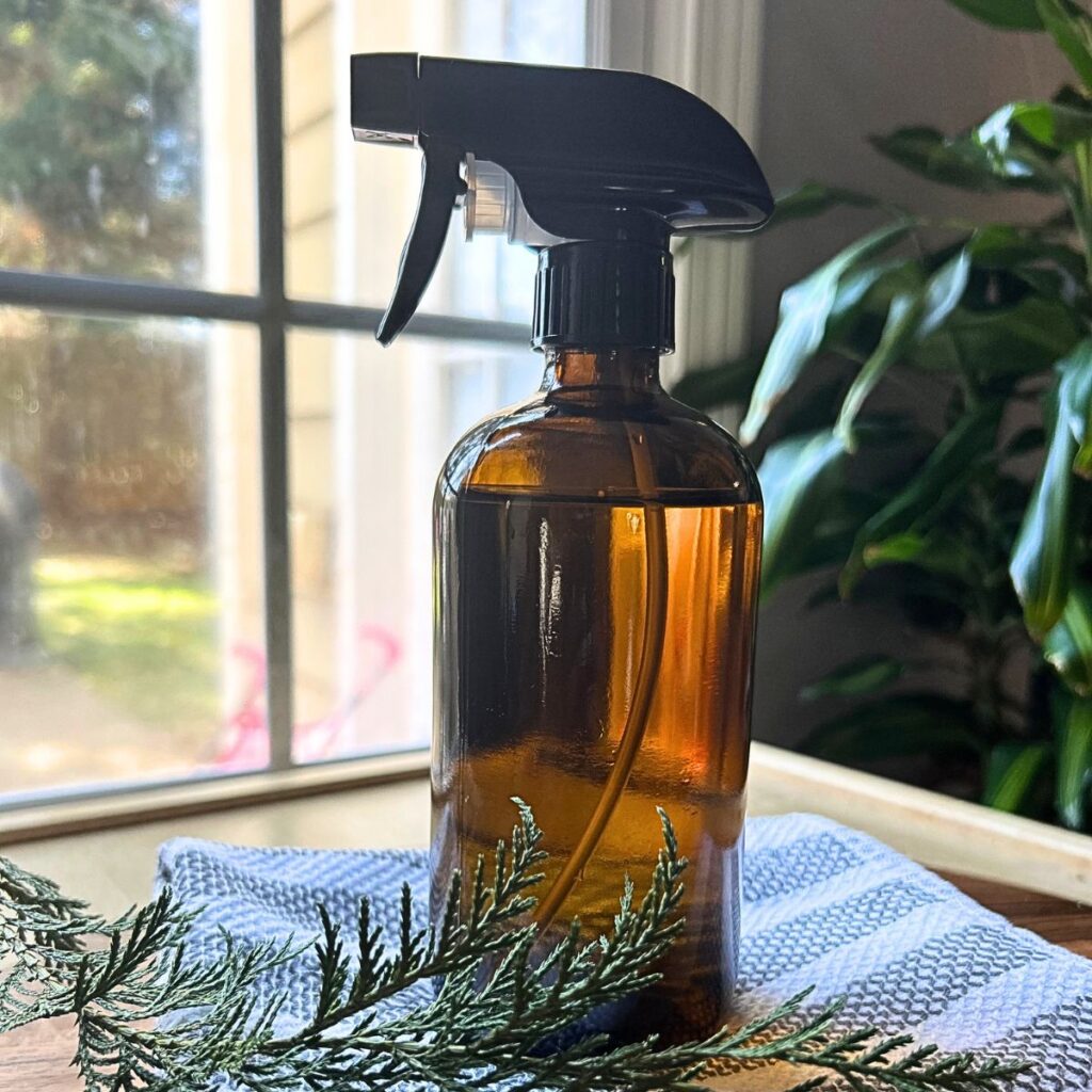 brown spray bottle with water or cleaner