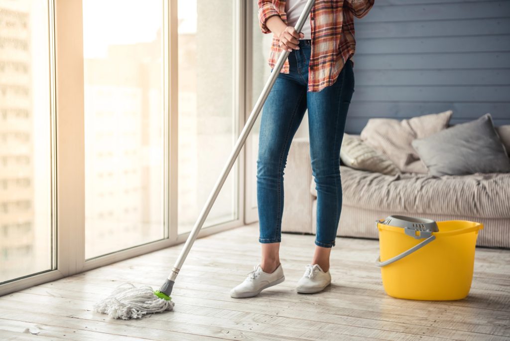 woman mopping floors