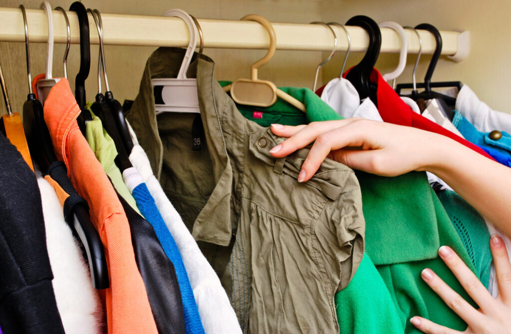 clothes on hangers in closet