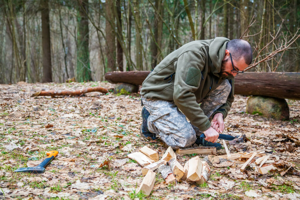 guy starting a fire
