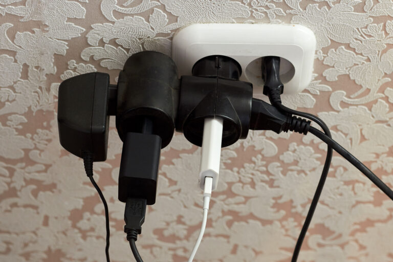 Improper use power supply. Overloaded socket, spark. Danger of electric shock, fire. Wire, plug, wall, fire.