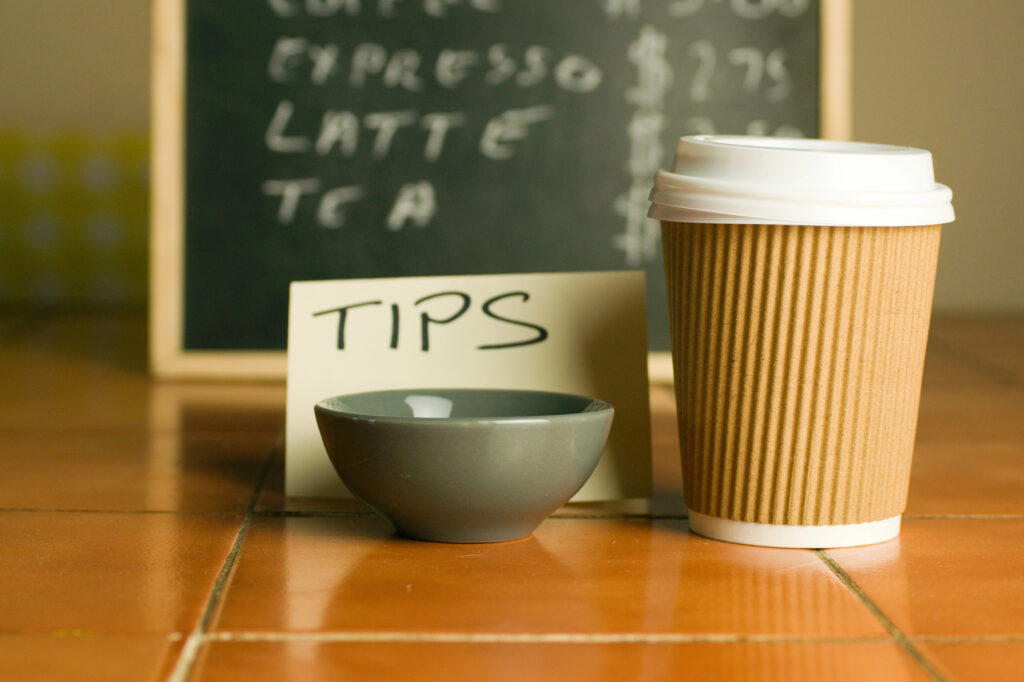 tipping coffee cup