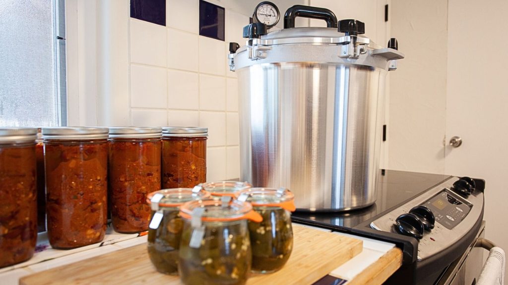 pressure canner canning jars in kitchen