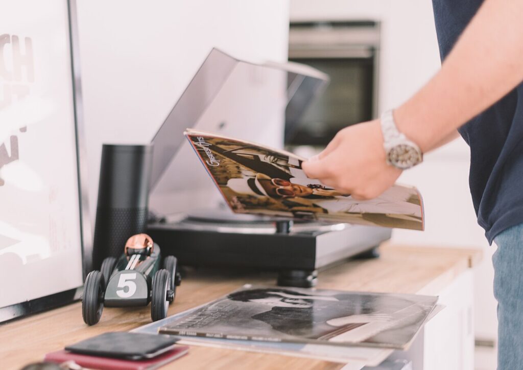 man looking at vinyl records