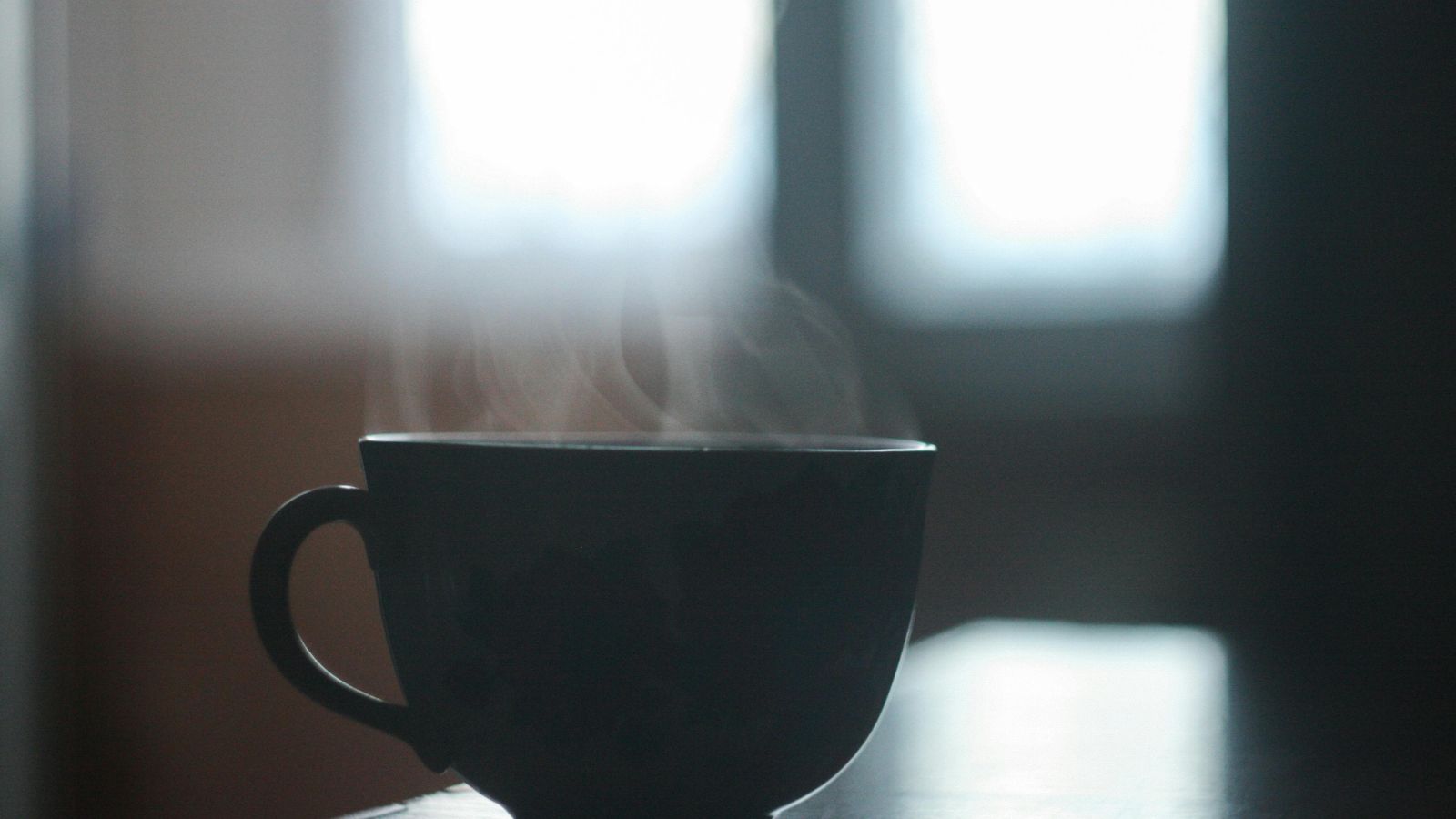 Black Ceramic Cup With Smoke Above