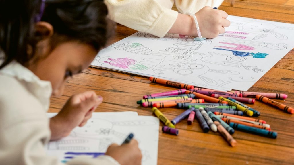 Children using crayons