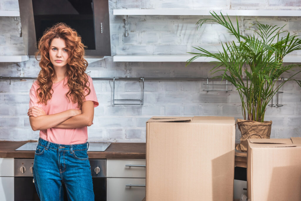 lady standing with boxes