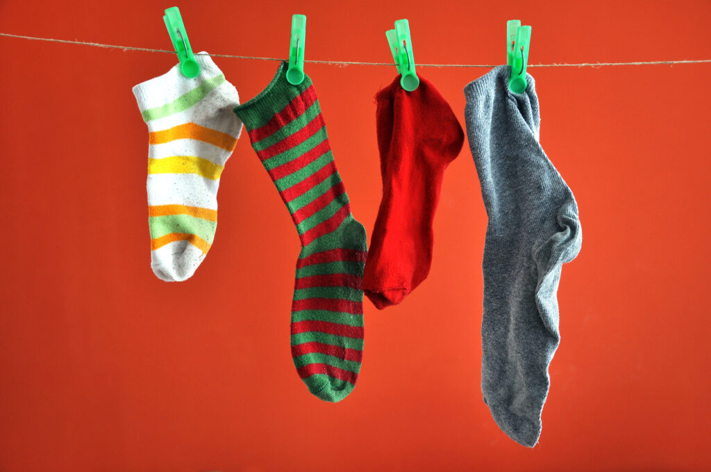 socks hanging on string
