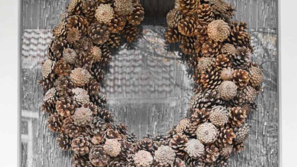 pine cone wreath on front door