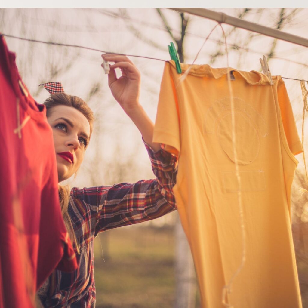 woman hanging laundry