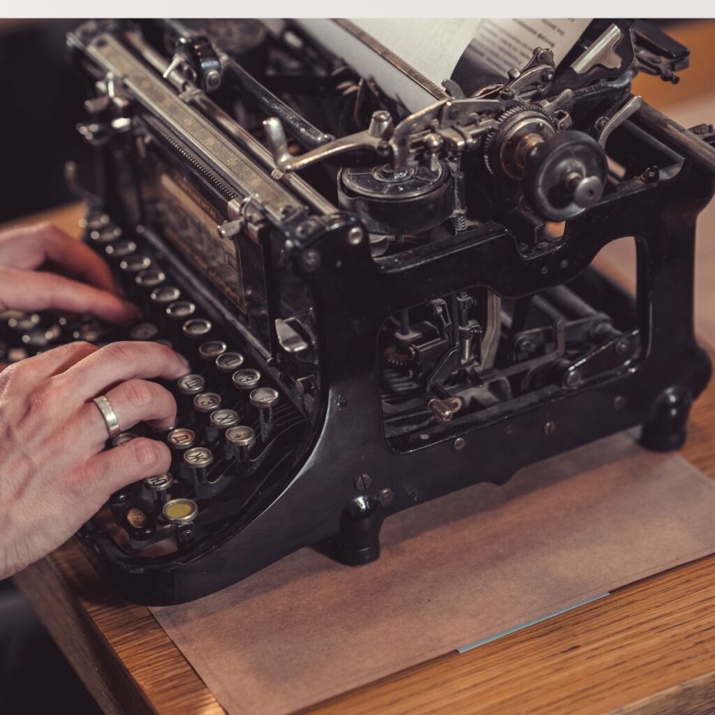 person on typewriter