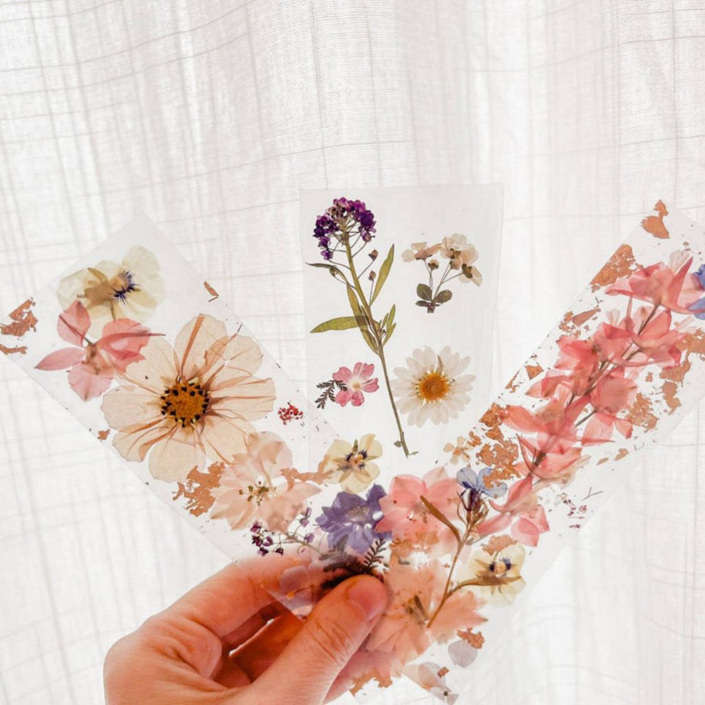 Hand Holding Pressed Flower Bookmarks