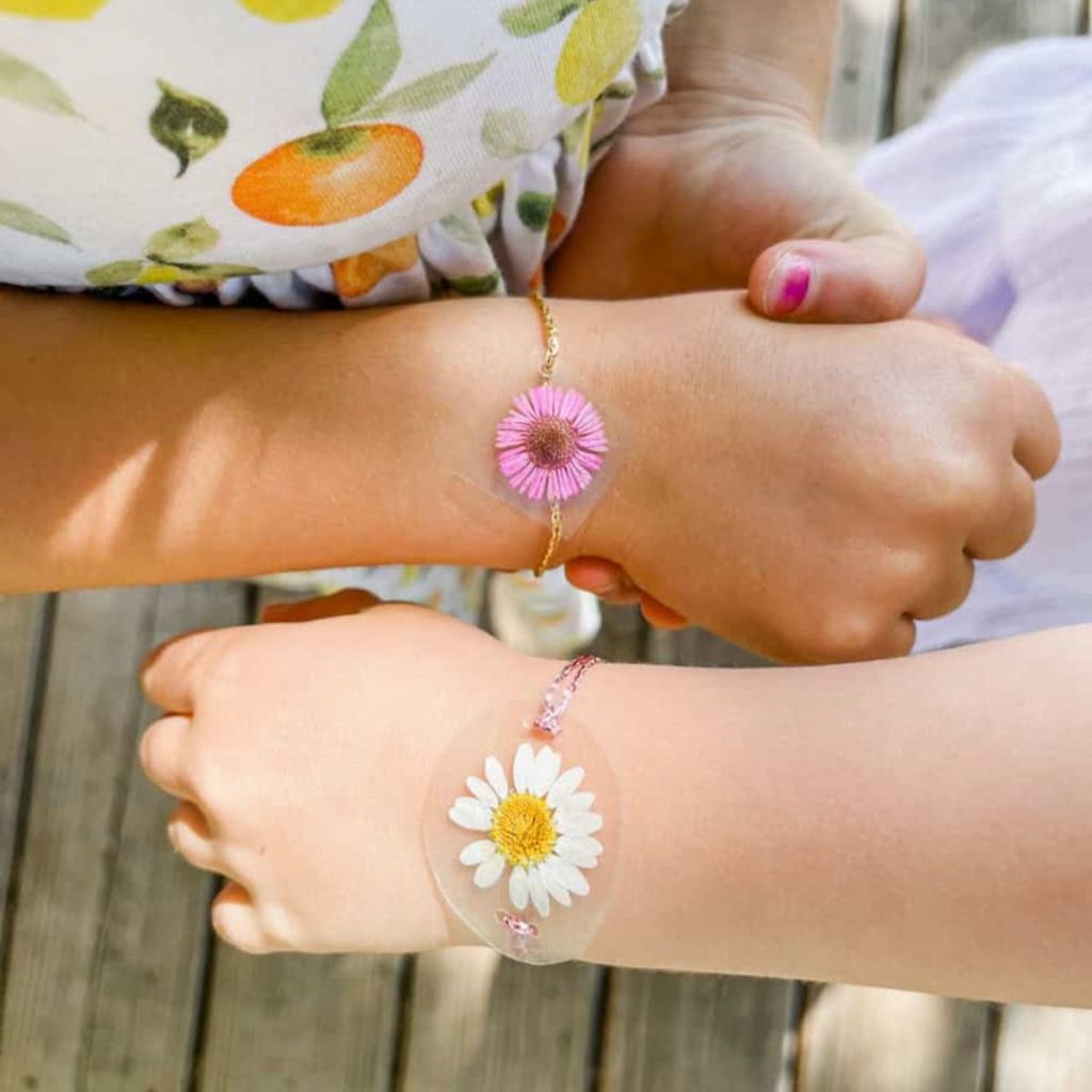 Kids wearing pressed flower bracelet