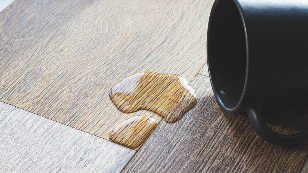 Laminate and water. Waterproof laminate. Wooden floors are impervious to moisture. Floor coverings protect from water. A puddle on the floor
