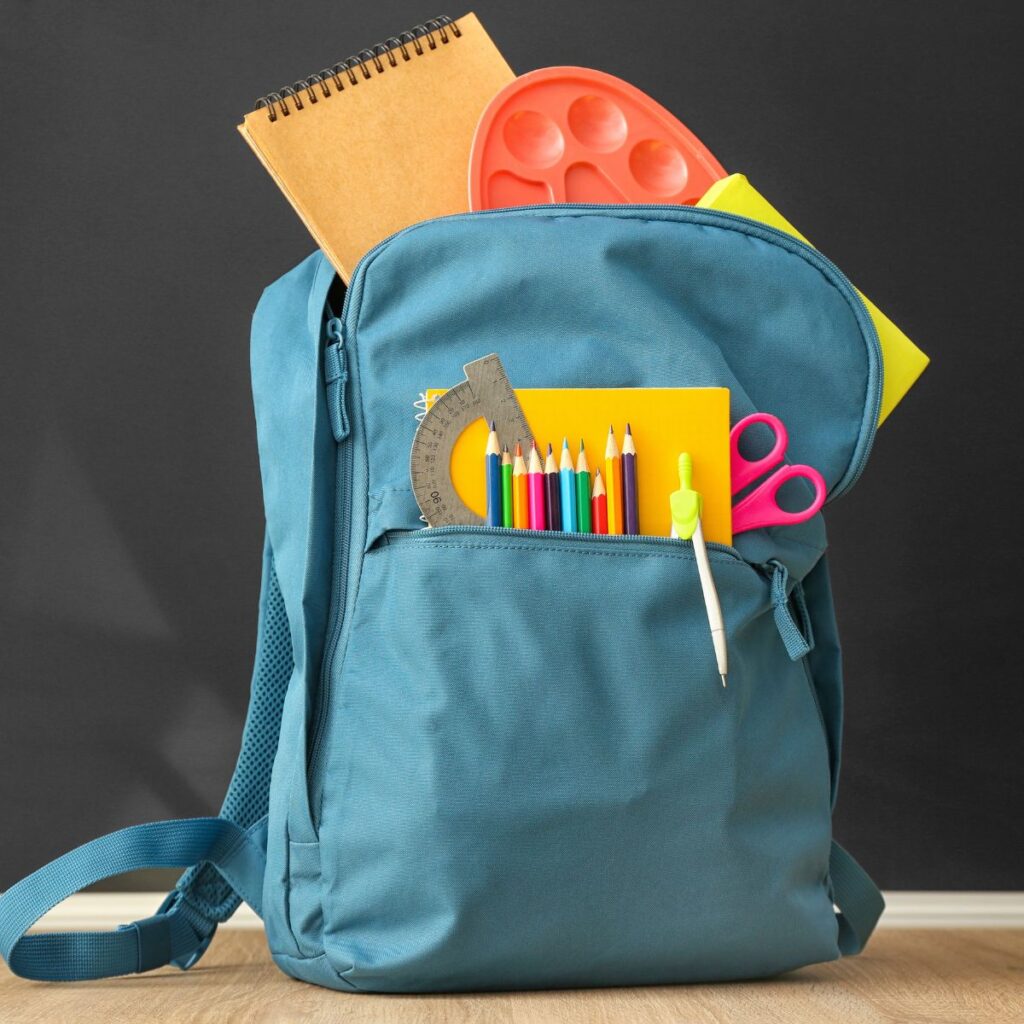 blue backpack with supplies
