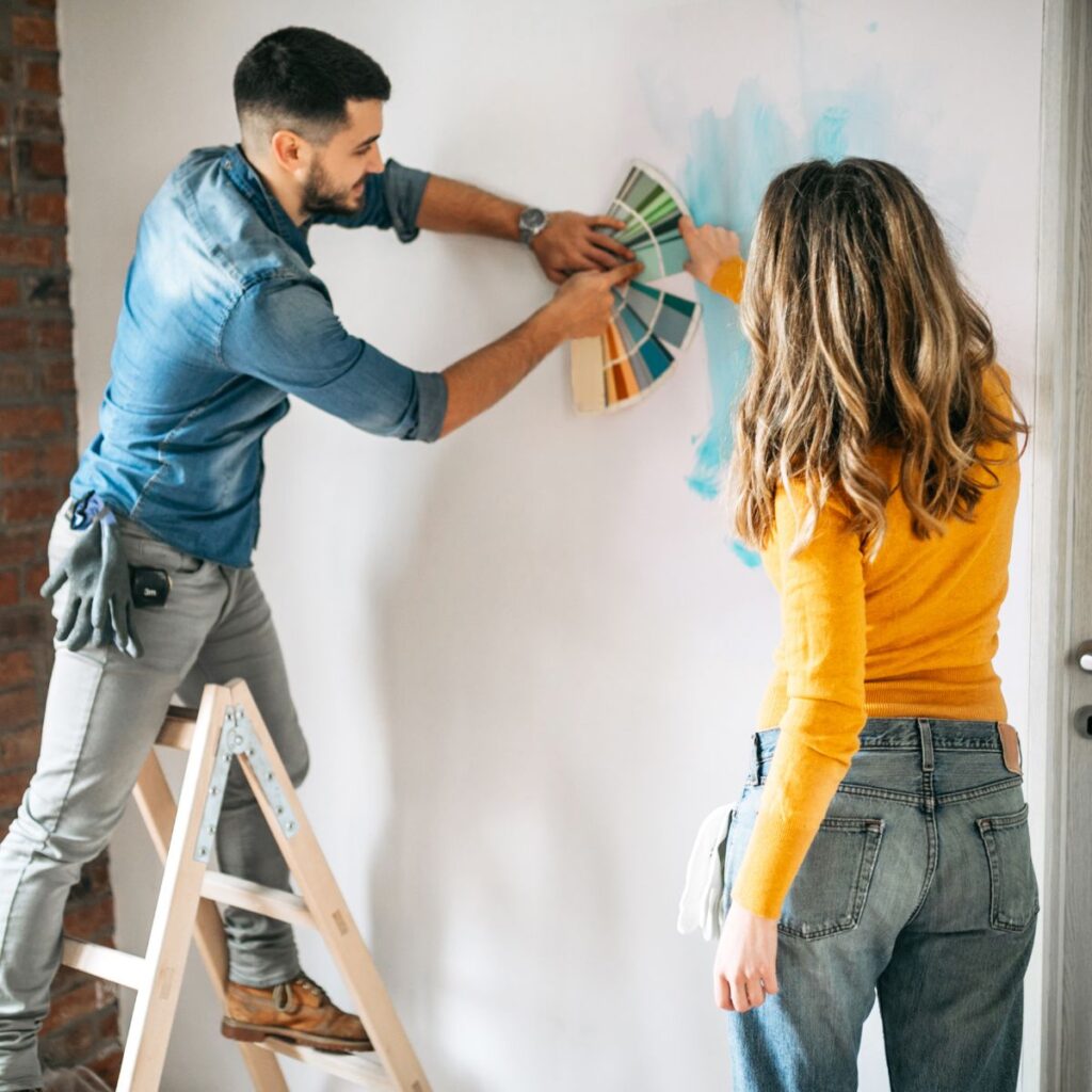 people painting house