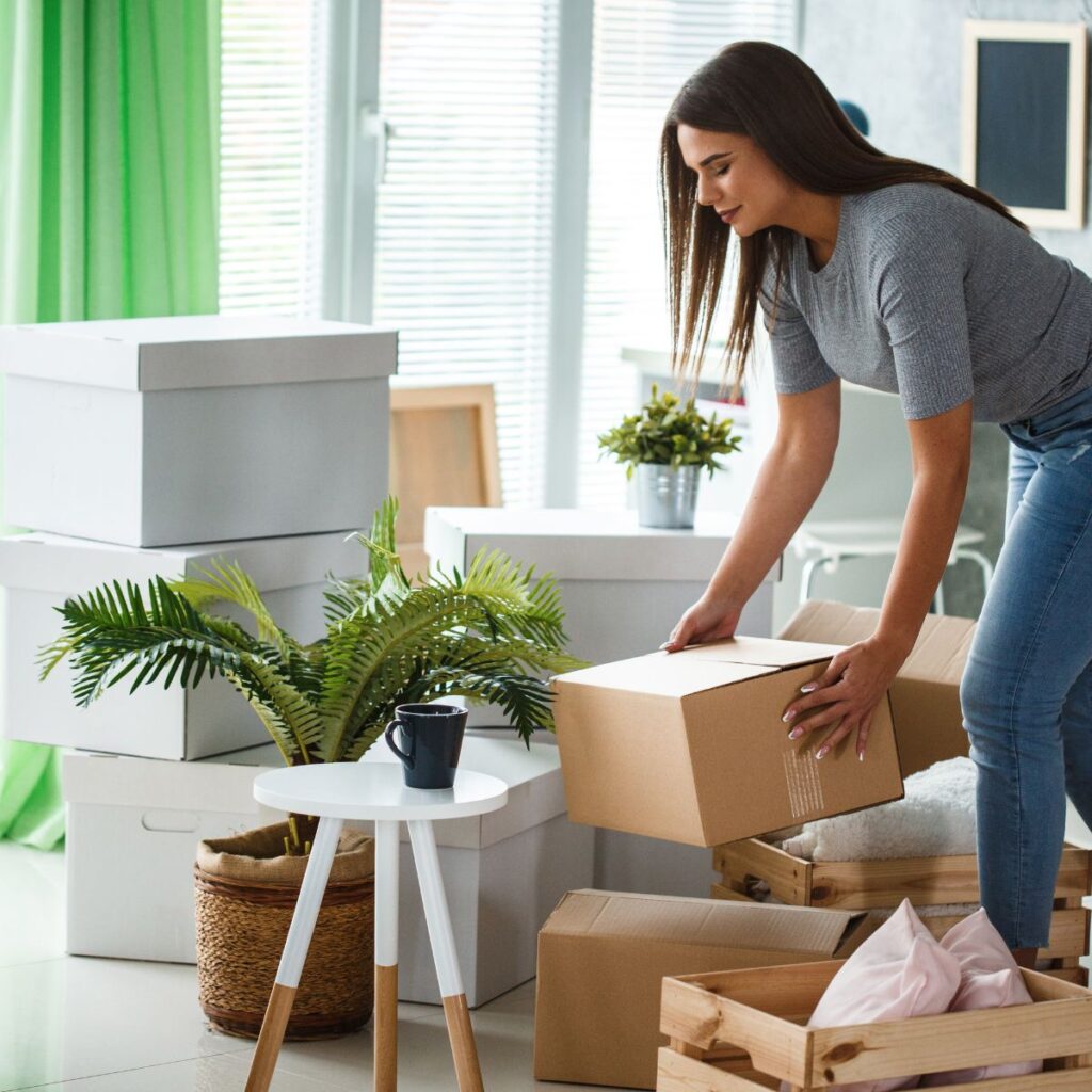 woman moving boxes