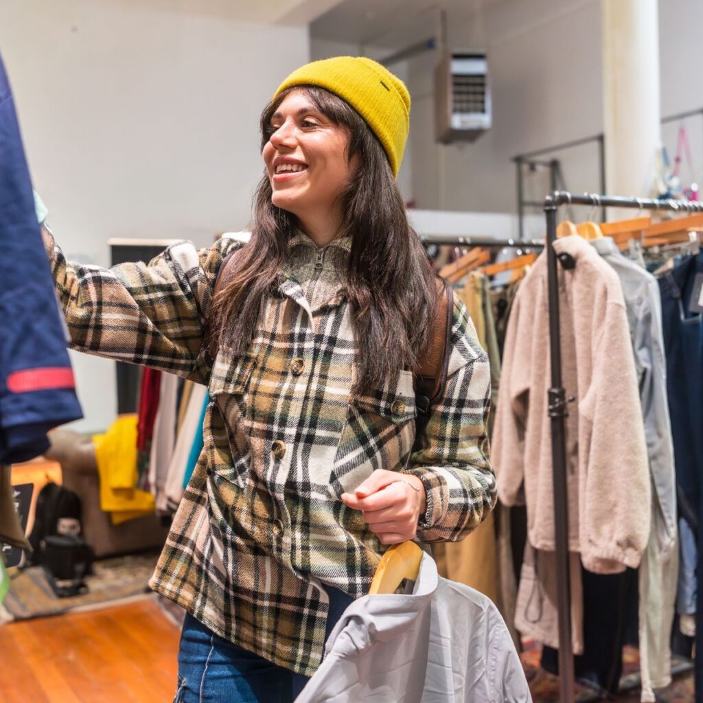 woman shopping at thrift store