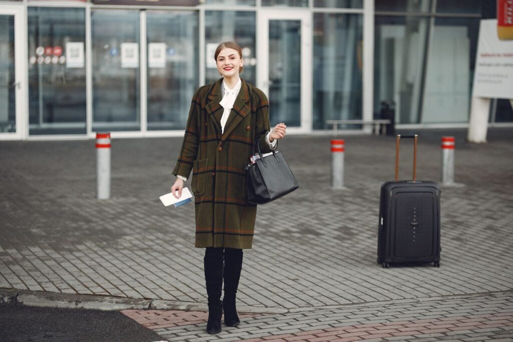 woman standing outside the airport