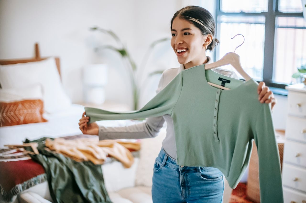 woman looking at new clothes