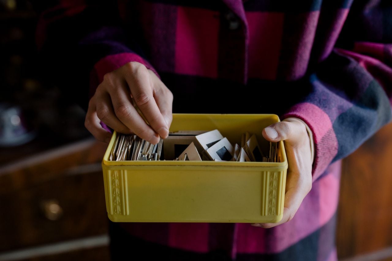man going through a box